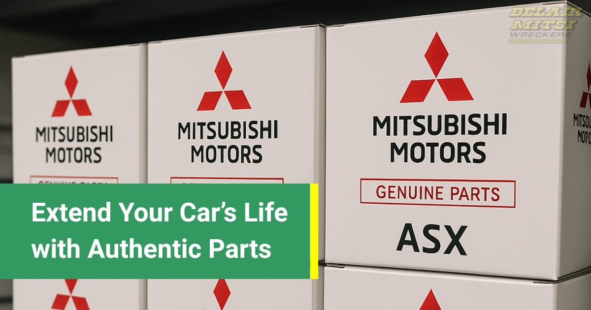Genuine Mitsubishi engine parts displayed on a workbench in a garage.